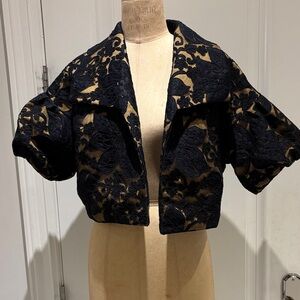 Black lace jacket lined with mustard gold